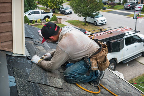 Professional Flat Roof Repair technician working in Ionia, NY